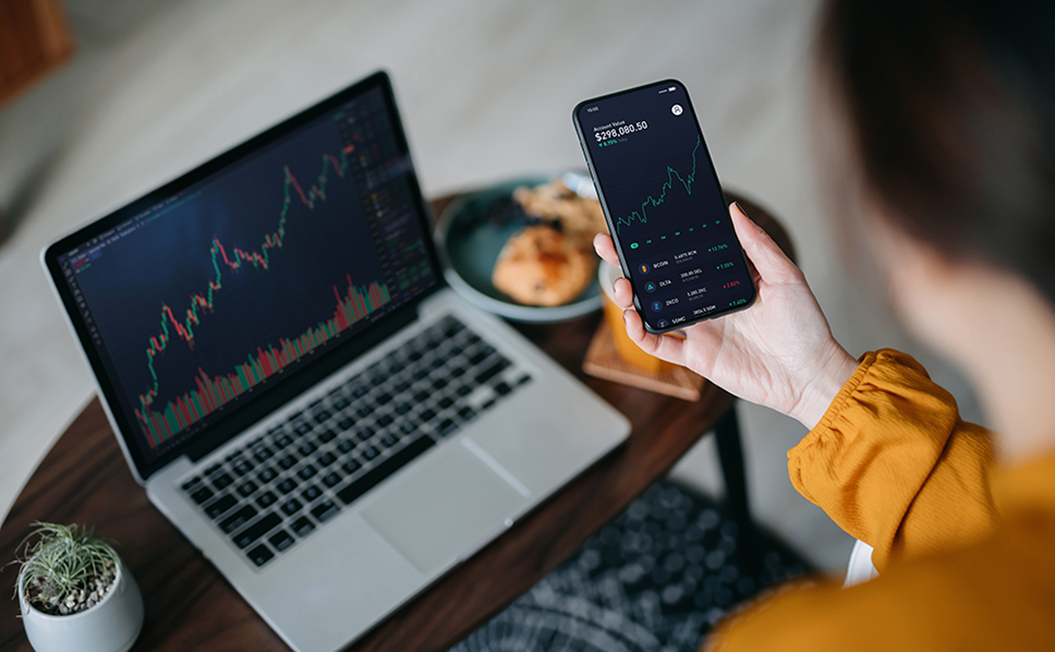 Marketer reviewing tailored insights on Ethical Research Solution's study design and sampling solutions on a phone and laptop.
