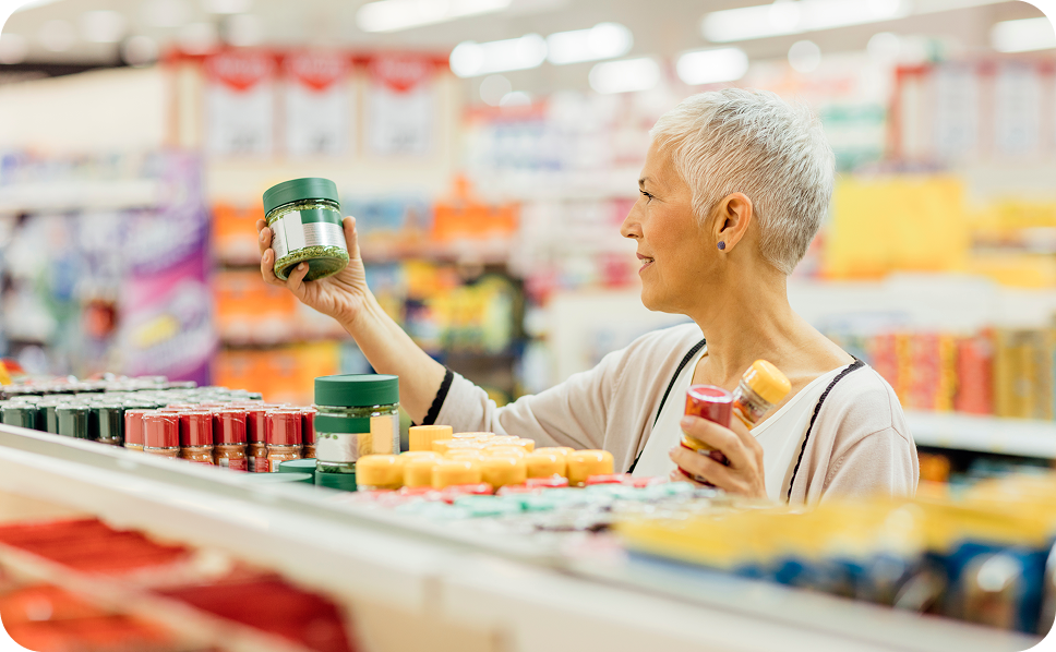 A woman who is shopping for grocercies whose consumer data will be collected and featured in ERS's scarborough data.