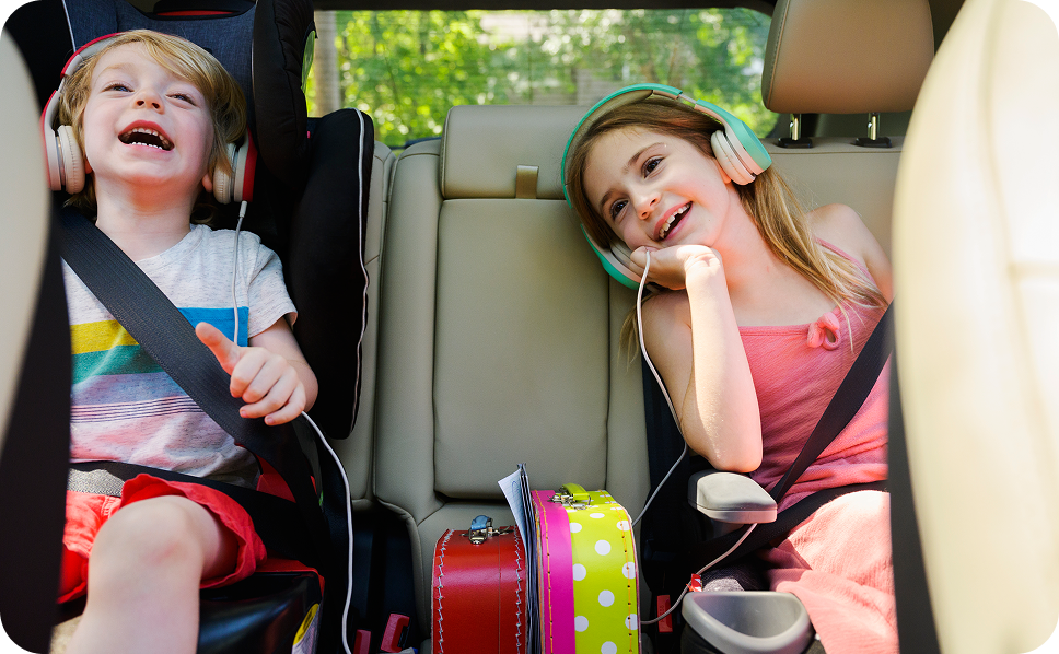 Kids sitting in the back of a car listening to music whose consumer data will be collected and featured in ERS's scarborough data.