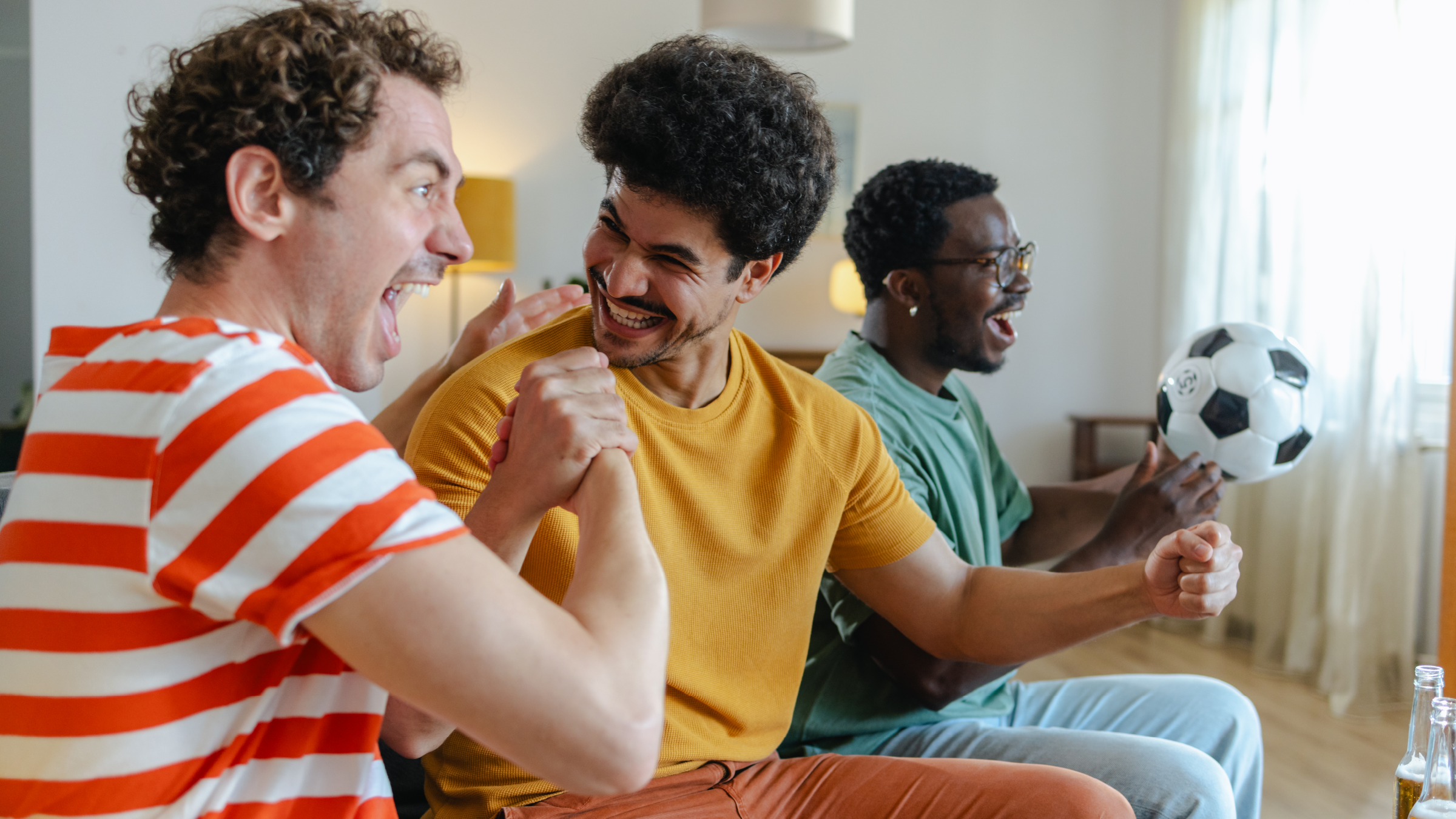 ERS's media impact tool helps measure the consumer data of the three men watching TV. 