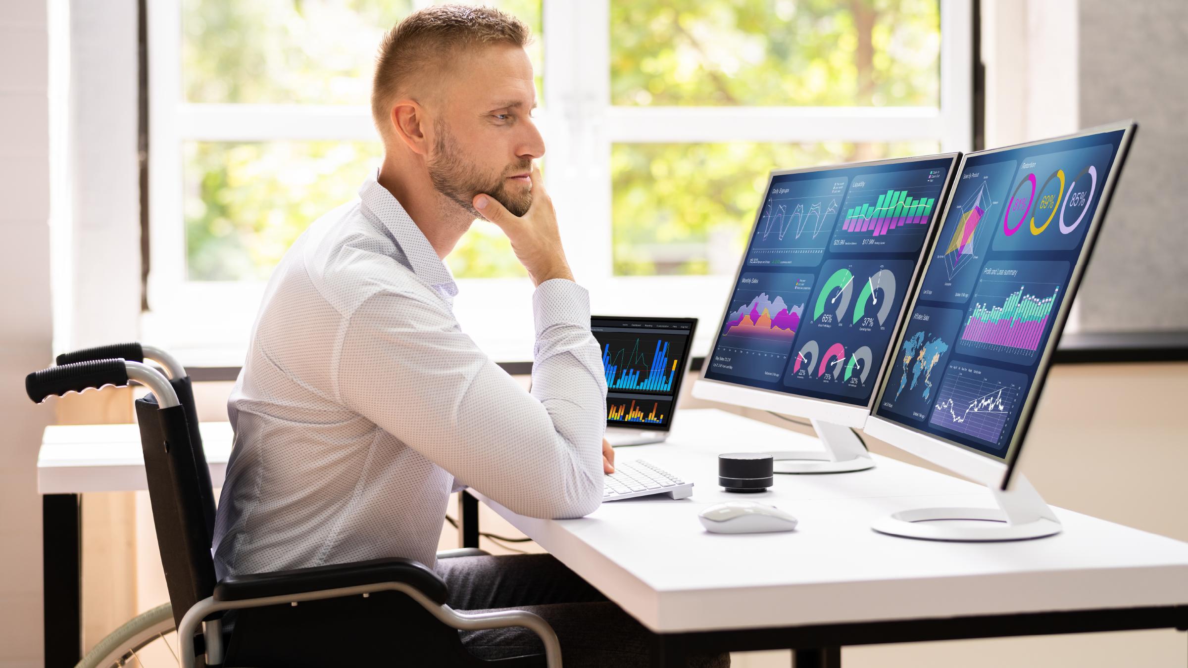 Marketer analyzing their media mix on a computer leveraging ERS's media impact solution.